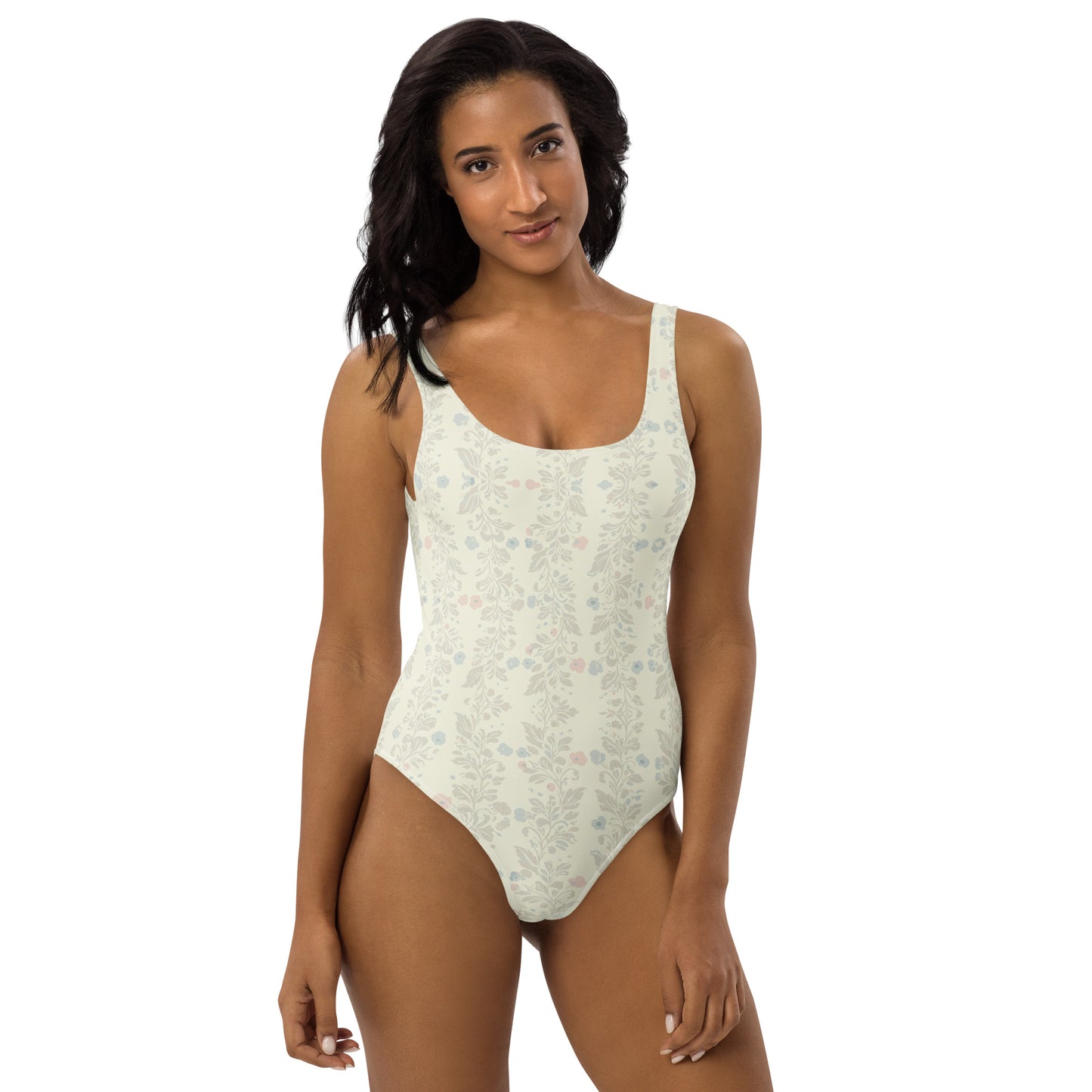 LuckeLadybug one-piece fashionable floral swimwear for women in light pastel colors with subtle flower pattern