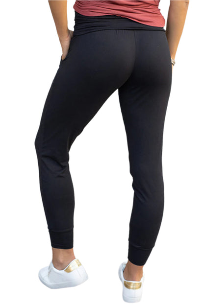 LuckeLadybug fashionable leggings with pockets in black worn with white sneakers