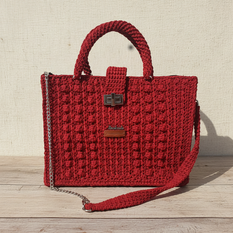 Flame Frame Structured Red Trapezoid Bag with a textured design and detachable shoulder strap
