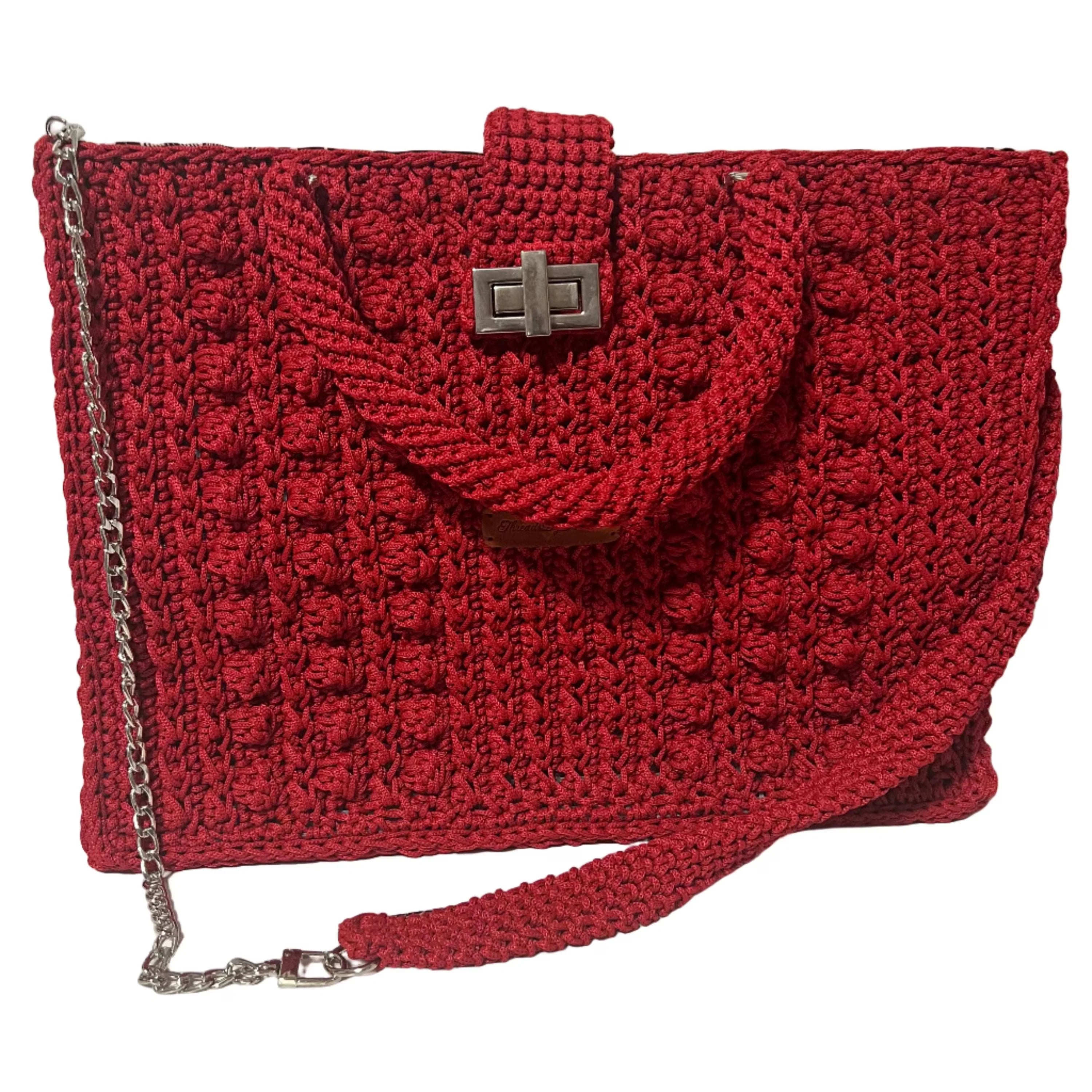 Flame Frame Structured Red Trapezoid Bag with a unique textured design and detachable strap