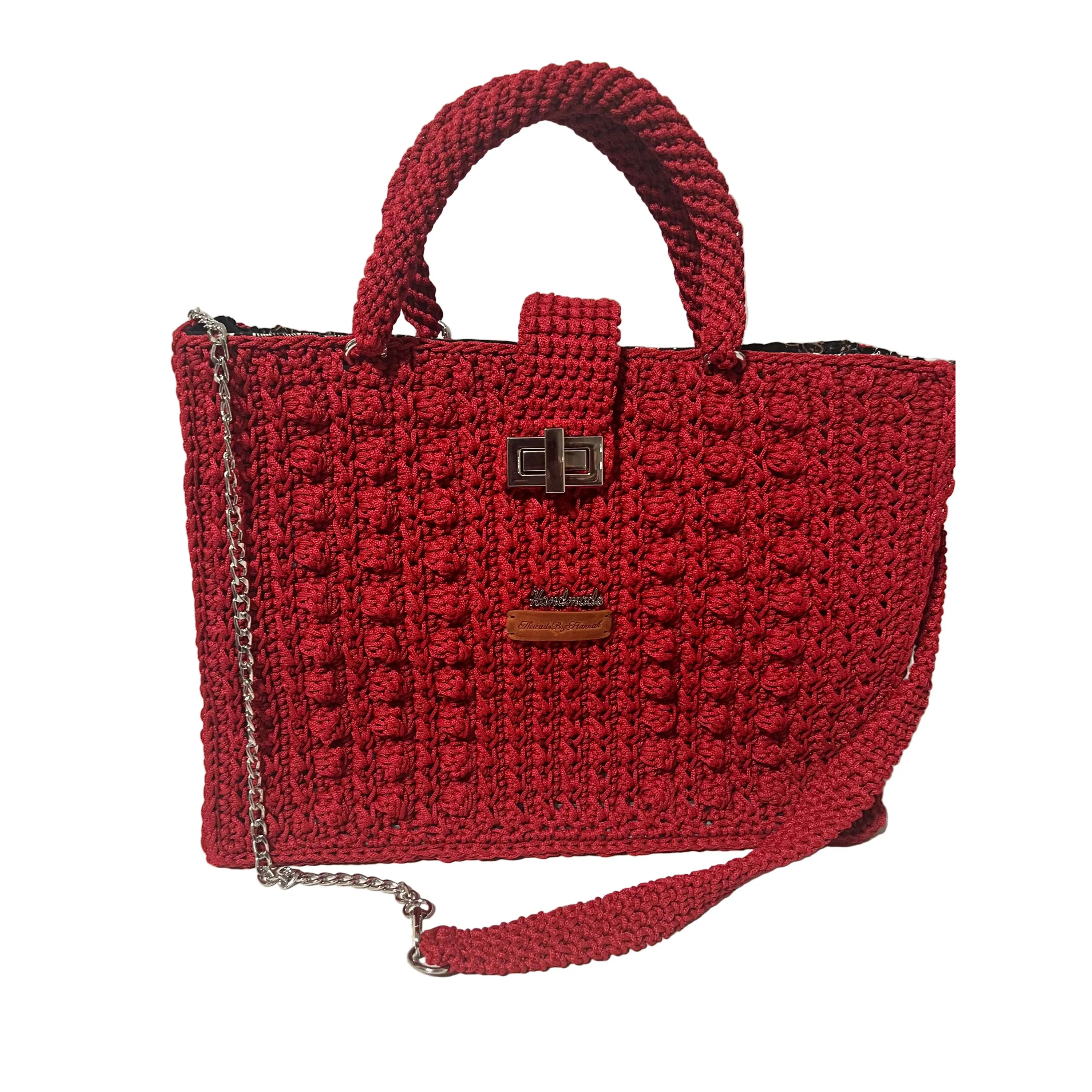 Flame Frame Structured Red Trapezoid Bag with textured knit design and detachable shoulder strap