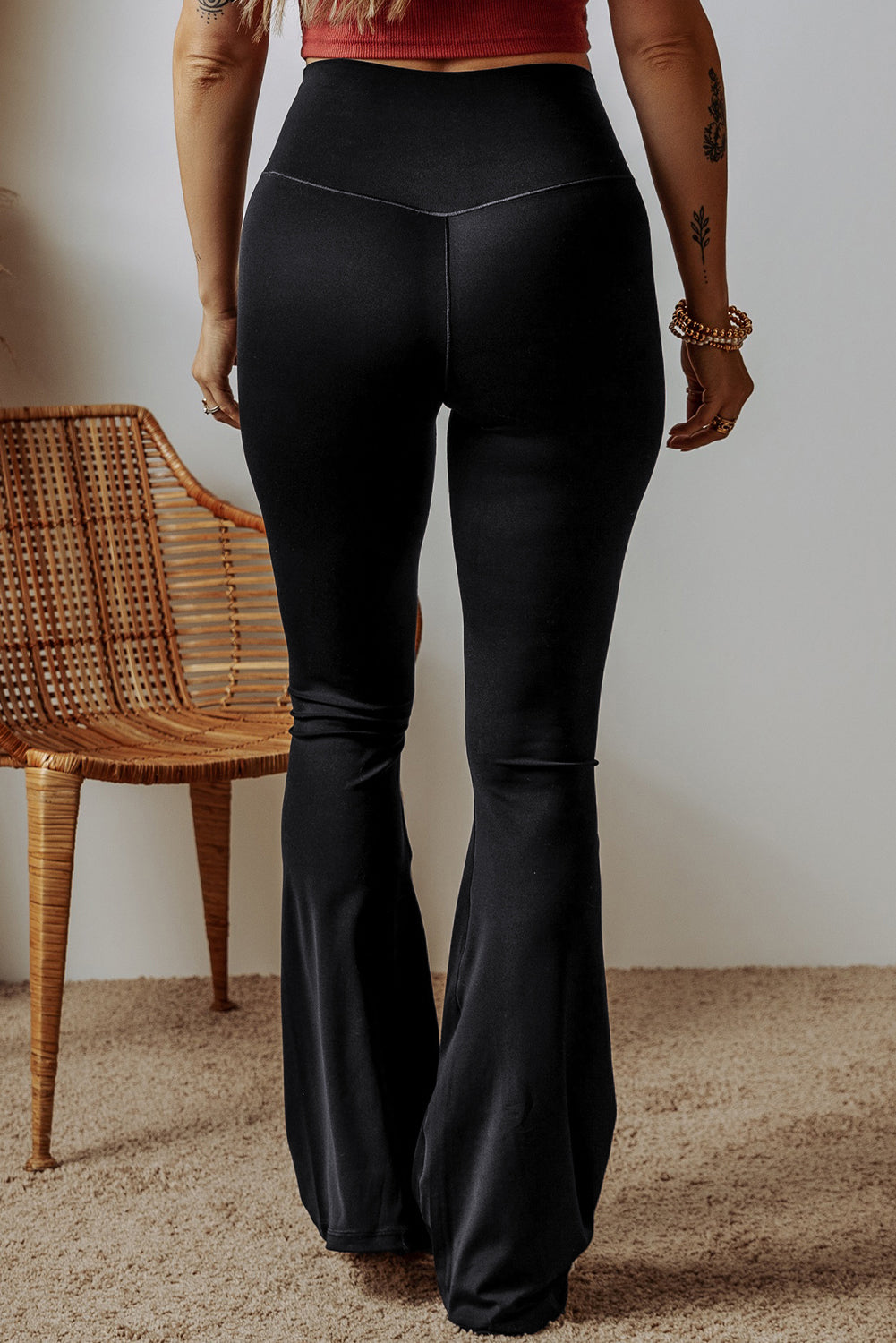 Black flared leggings from LuckeLAdybug LLC with a comfortable fit and stylish design