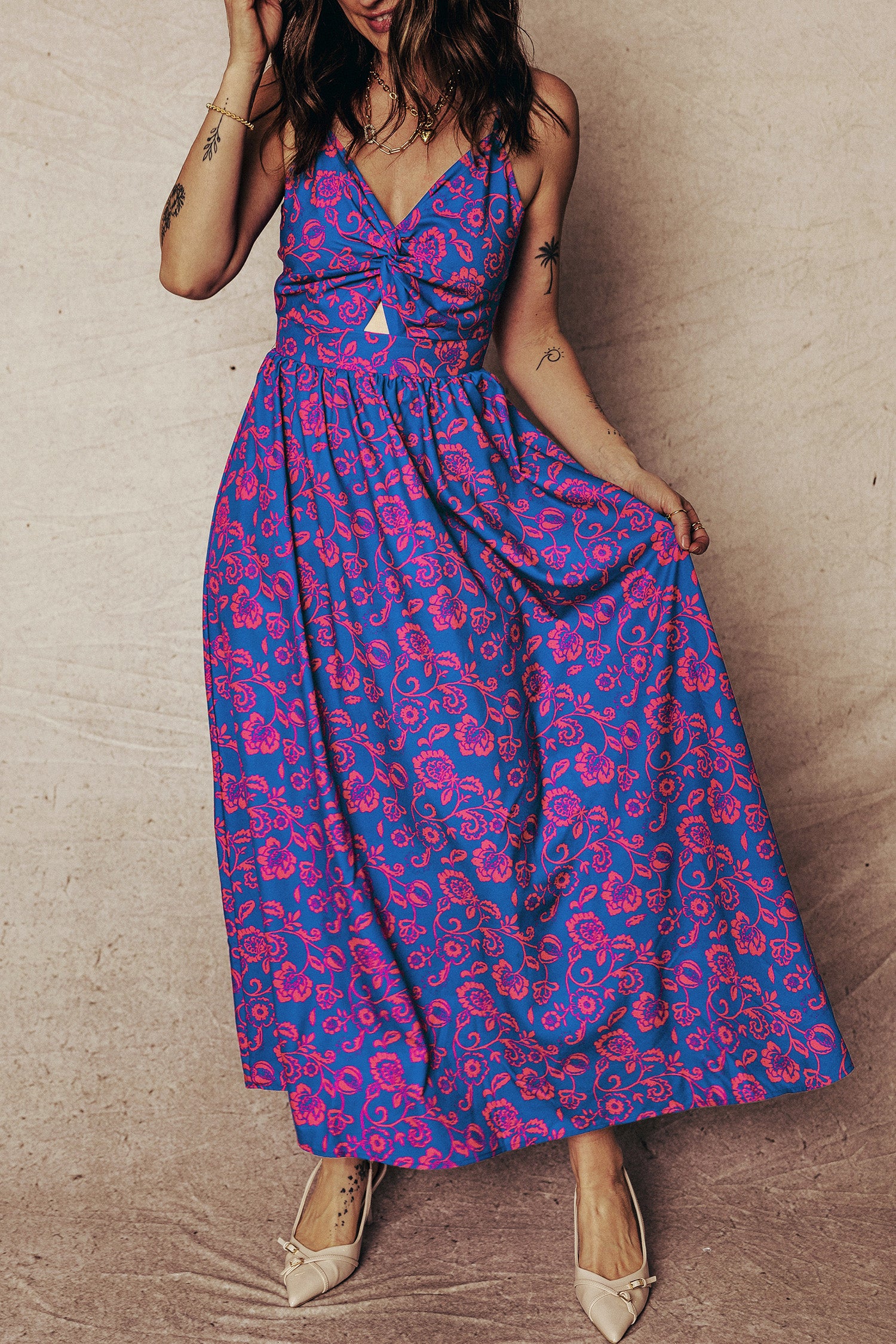 Vibrant Fit & Flare design in purple and pink floral pattern with adjustable straps and maxi dress.