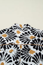 Back view of a floral dress dress with a unique black and gold print, perfect for any occasion