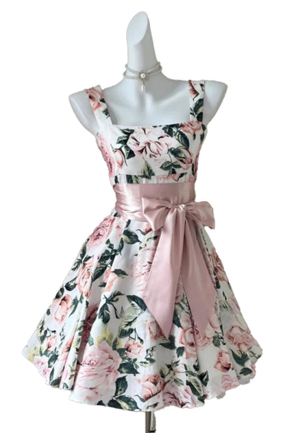 Floral sleeveless mini dress for women with a pink sash and floral pattern for a stylish summer look