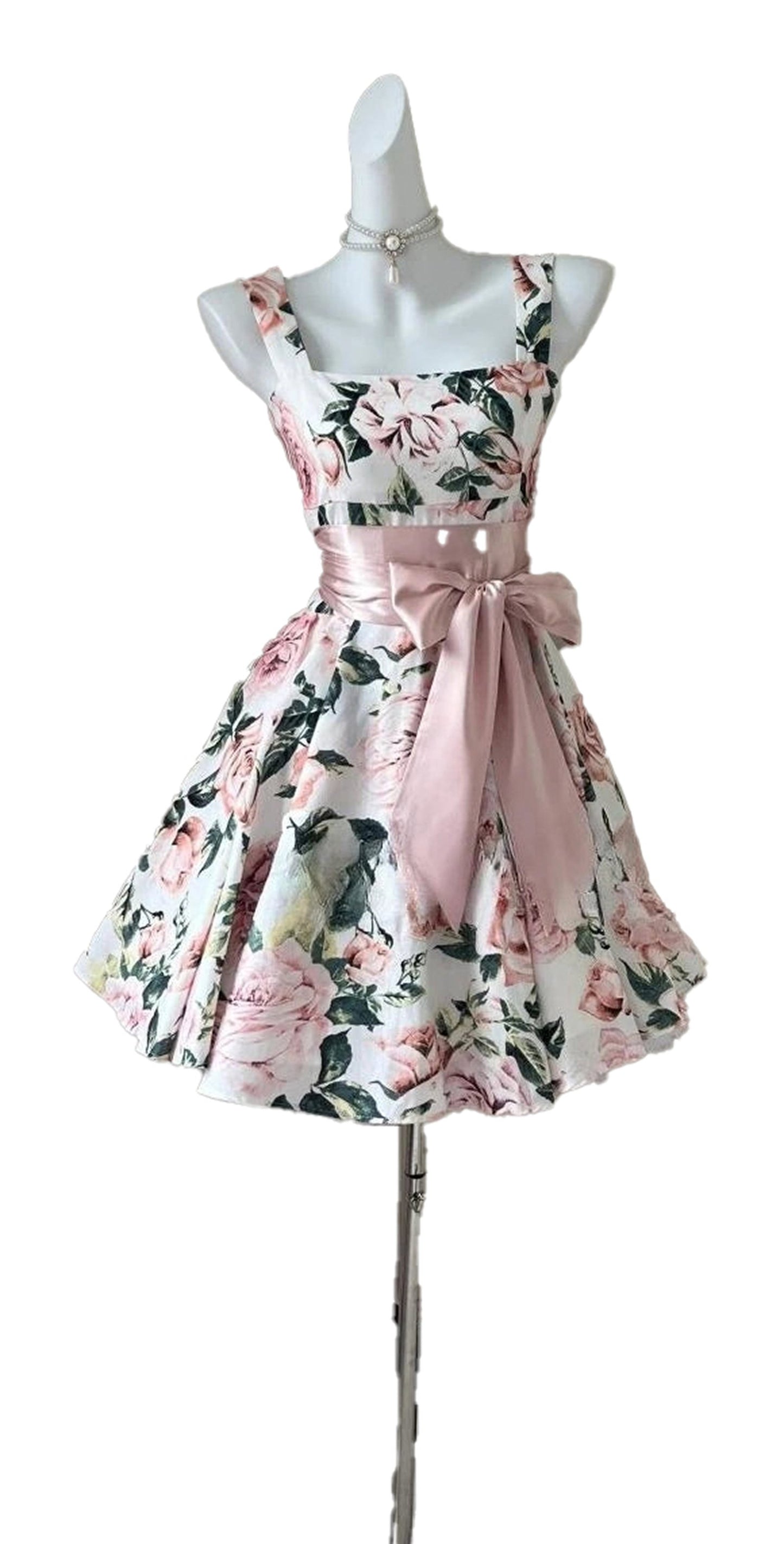 Floral sleeveless mini dress for women with a fitted bodice and elegant bow detail