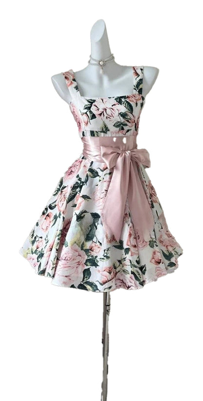 Floral sleeveless mini dress for women with a fitted bodice and elegant bow detail