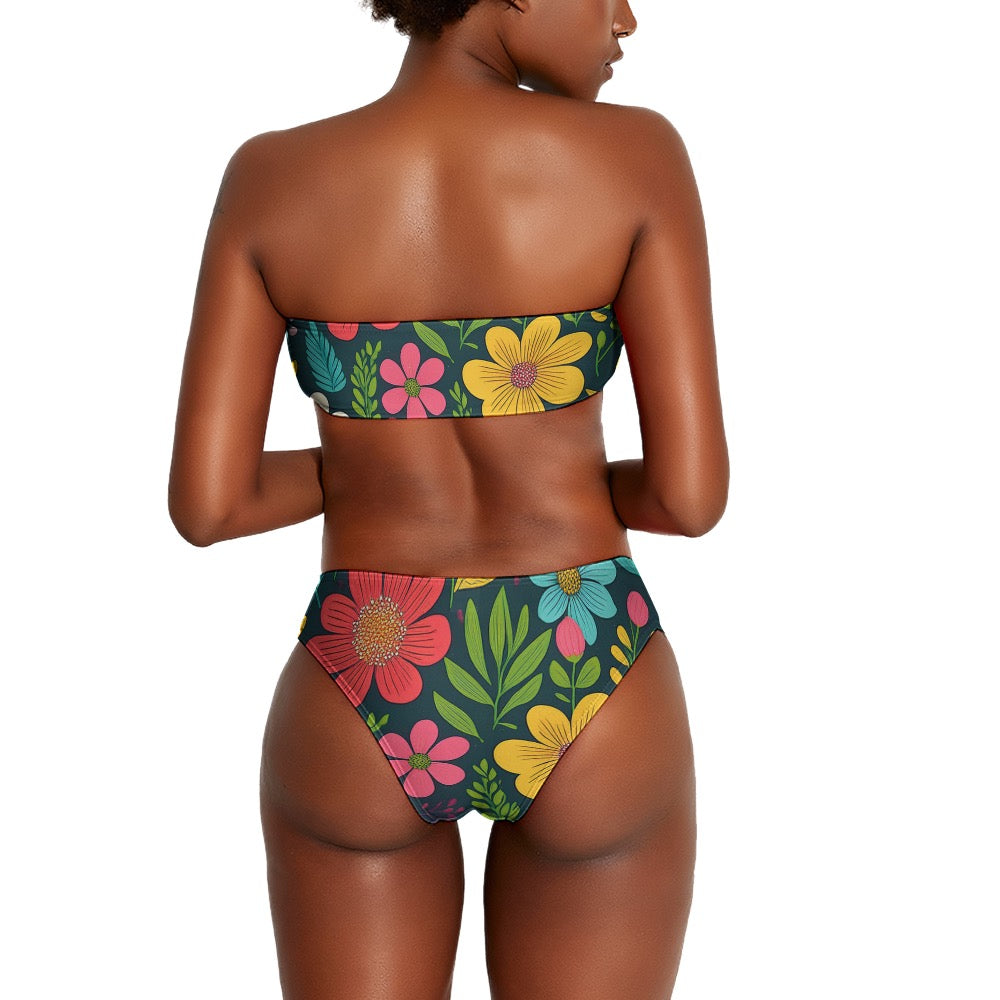 Back view of woman wearing Inkedjoy floral two piece bikini with colorful flowers and green leaves
