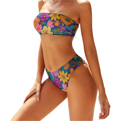 floral two piece bikini with colorful yellow and purple flowers worn by model by pool