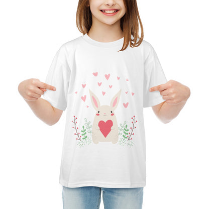 white bunny print kids shirt with cute bunny holding a heart and surrounded by pink hearts and plants