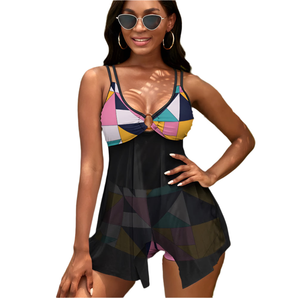 Geometric 90s swimsuit set by luckeladybug featuring colorful top with keyhole detail and black flowy shorts