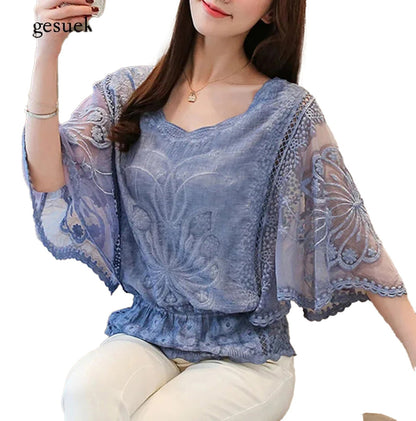 Elegant flower lace half sleeve blouse in soft blue with a flattering silhouette and delicate design
