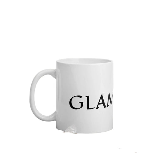 White ceramic mug with black text partially showing glam ma coffee mug design