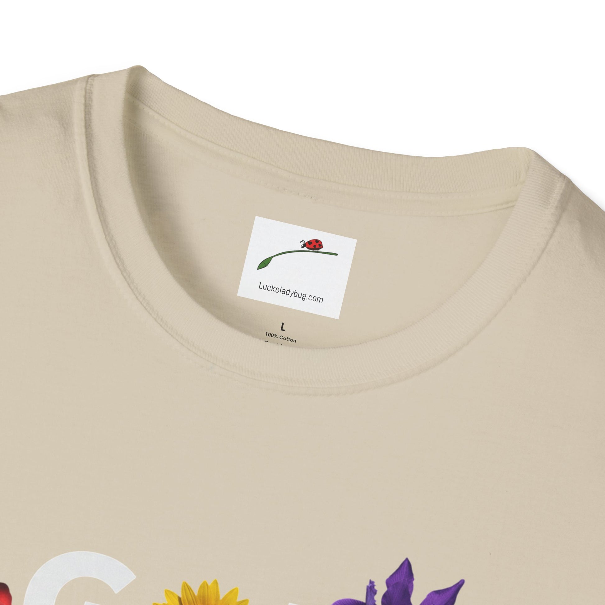 LuckeLadybug beige God Made t-shirt with colorful floral design and round neckline