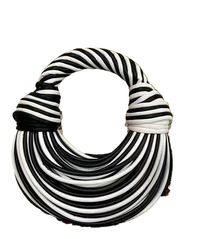 Stylish black and white hobo bag from LuckeLadybug LLC, perfect for casual outings