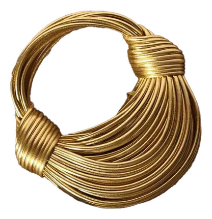 Luxurious gold designer handwoven handbag with elegant twisted detailing for stylish accessorizing