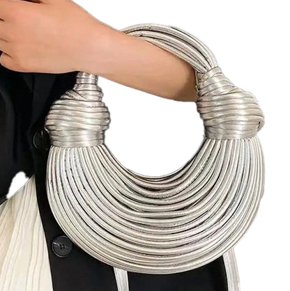 Elegant gold designer handwoven handbag with a unique, stylish design suitable for various outfits