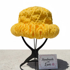Golden Horizon Wavy Brim Crochet Hat in bright yellow with a unique ruffle design, handmade with love