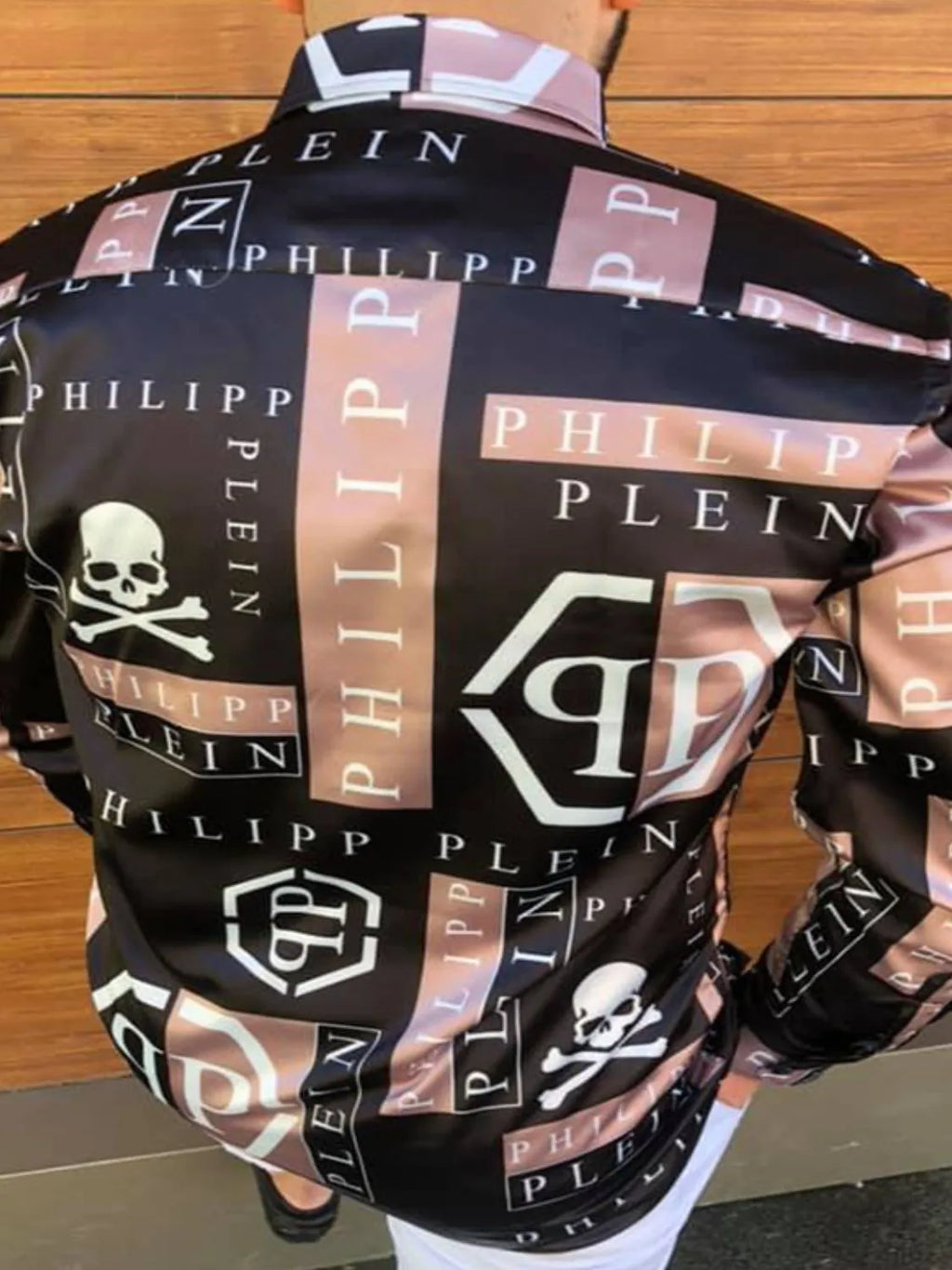 Stylish button-up shirt with graphic print, perfect for pairing with a graphic men's t shirt