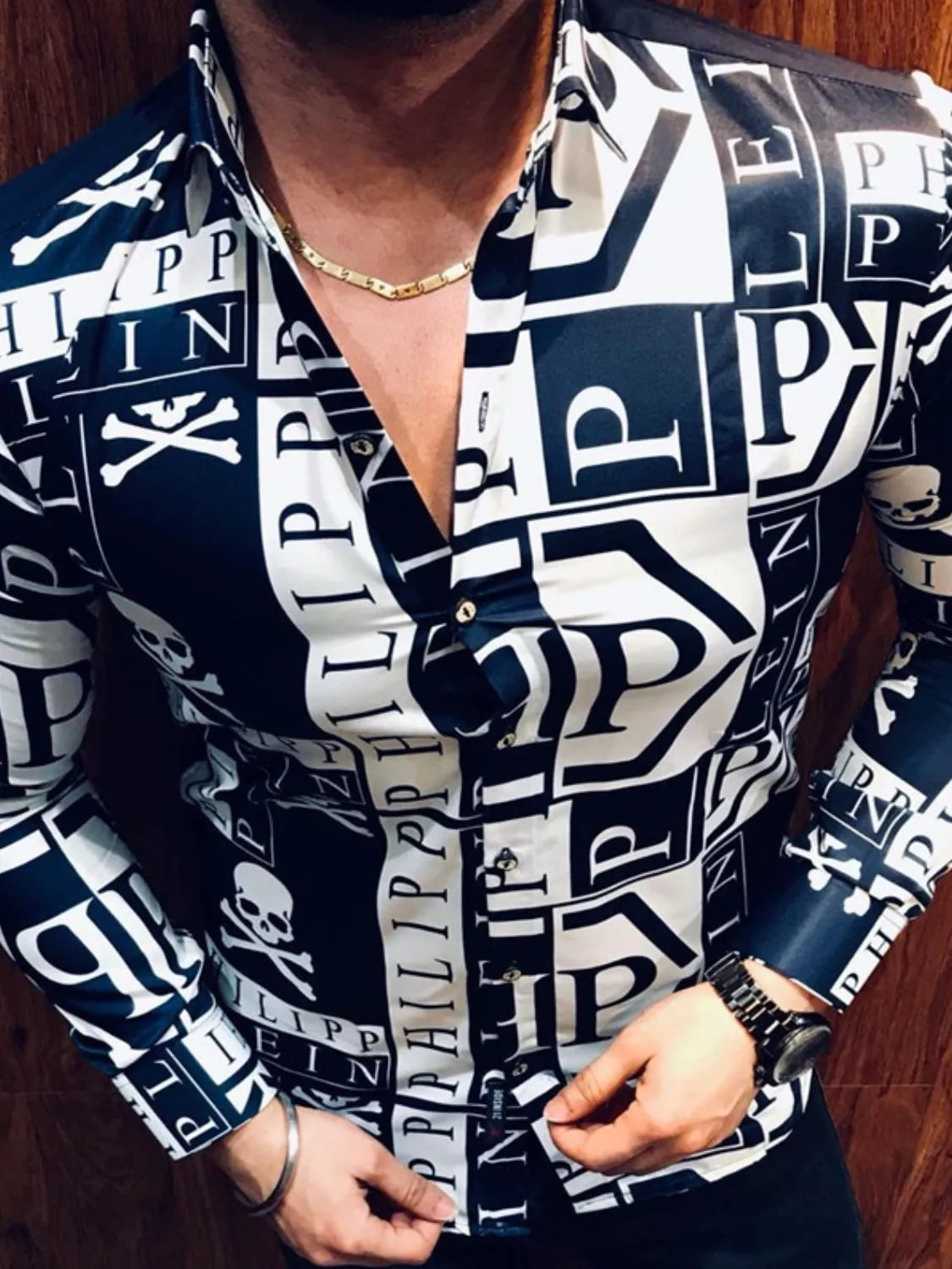 Stylish button-up shirt from LuckeLadybug LLC with a graphic men's t shirt design featuring bold prints