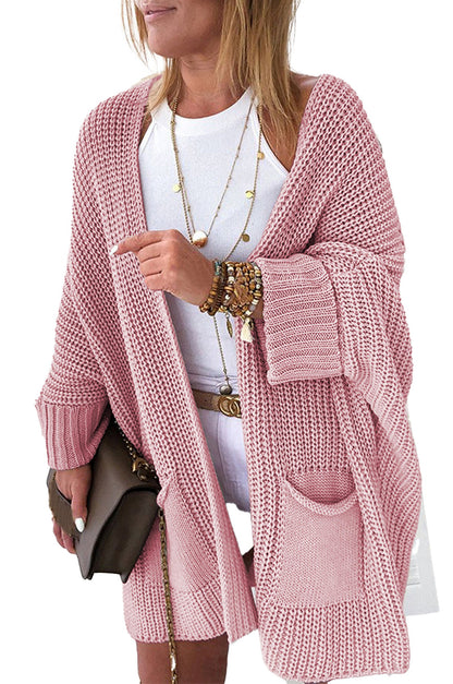 Pink oversized cardigan for women by LuckeLadybug featuring pockets and a relaxed fit