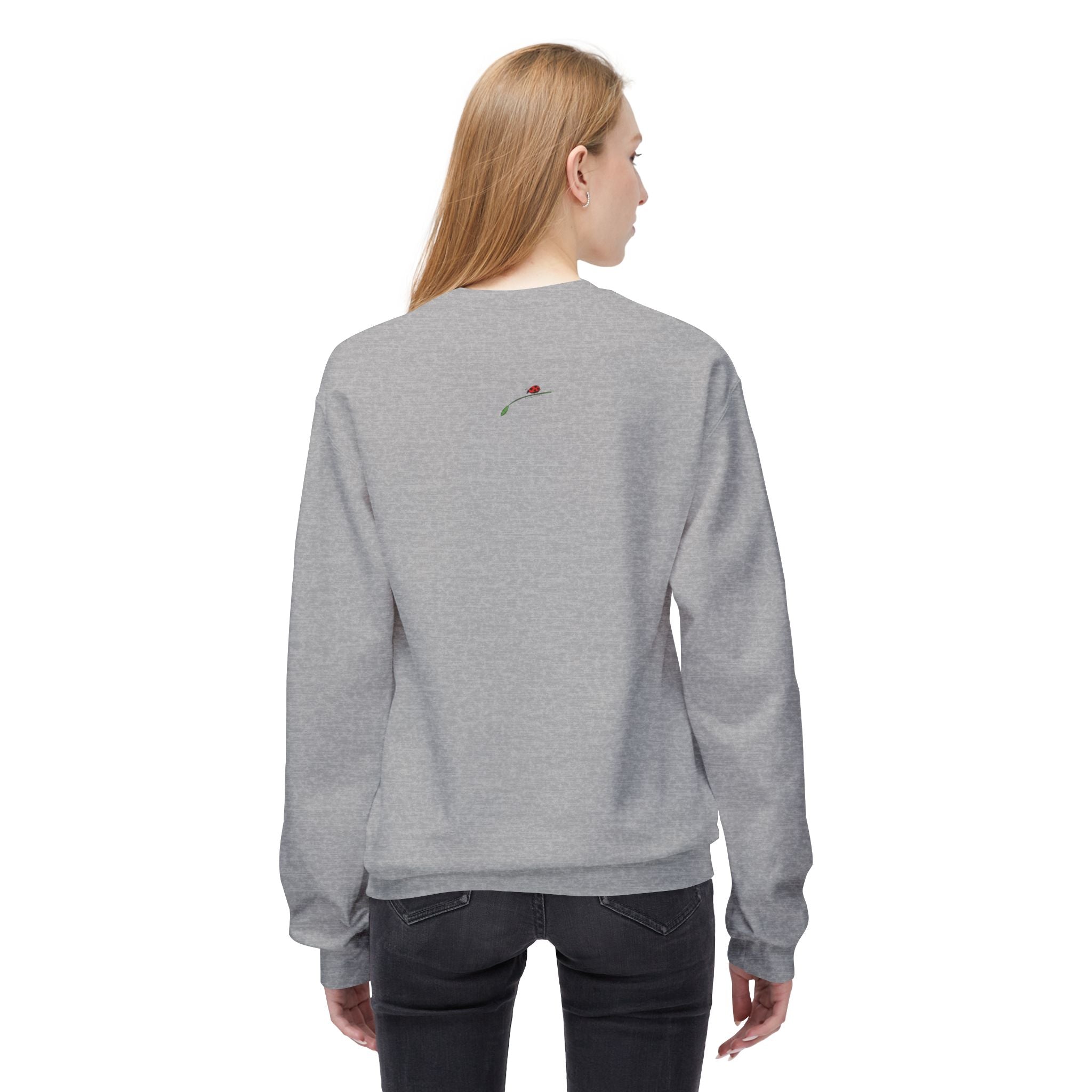 Gray sweatshirt with small rose detail on back worn by woman Yorkie dog lover sweatshirt