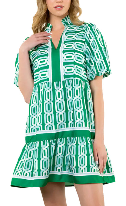 LuckeLadybug green abstract mini dress featuring a unique geometric design and playful fit.