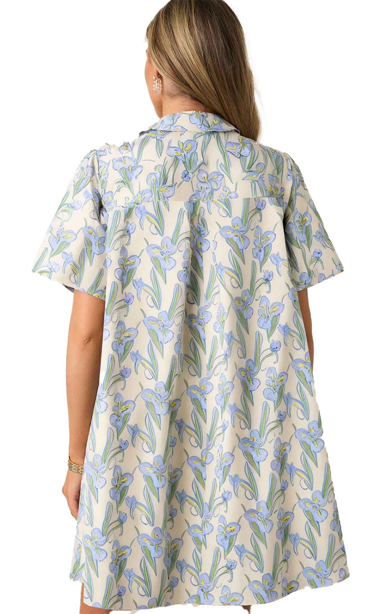 Back view of a green floral shift dress by LuckeLadybug with short sleeves and a relaxed fit.