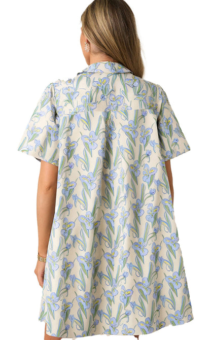 Back view of a green floral shift dress by LuckeLadybug with short sleeves and a relaxed fit.