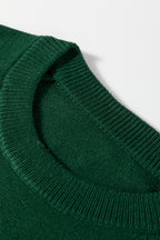 Close-up of a green sweater collar, ideal for pairing with a white MERRY Christmas sweater