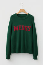 Green sweater with red MERRY Christmas sweater graphic for festive holiday style
