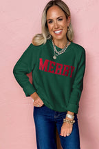 Women's green sweater with red MERRY Christmas sweater design for festive holiday wear