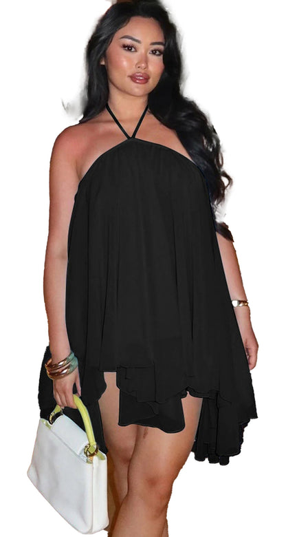 Model wearing a black halter chiffon mini dress with flowy design, perfect for summer outings