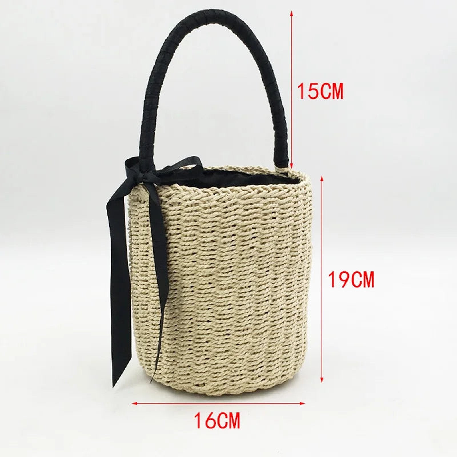 Handmade straw beach bag for women with black handle and ribbon, perfect for summer outings