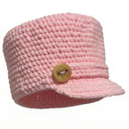 Pink handmade hat with a stylish button on the front, perfect for fashion-forward looks