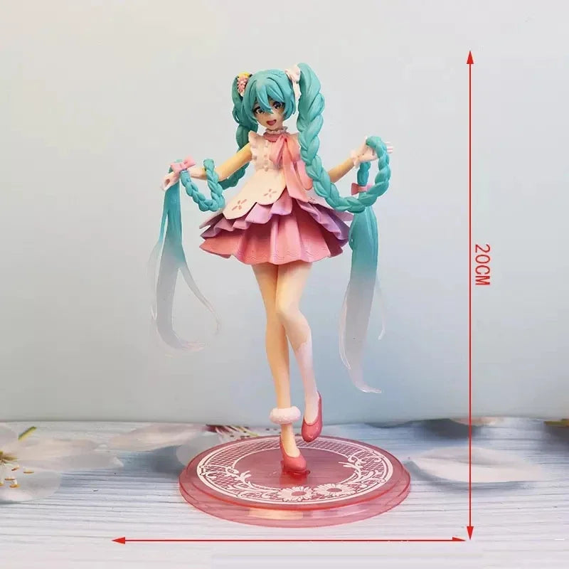 Hatsune and Miku figurine standing 20cm tall with vibrant blue hair and pink dress