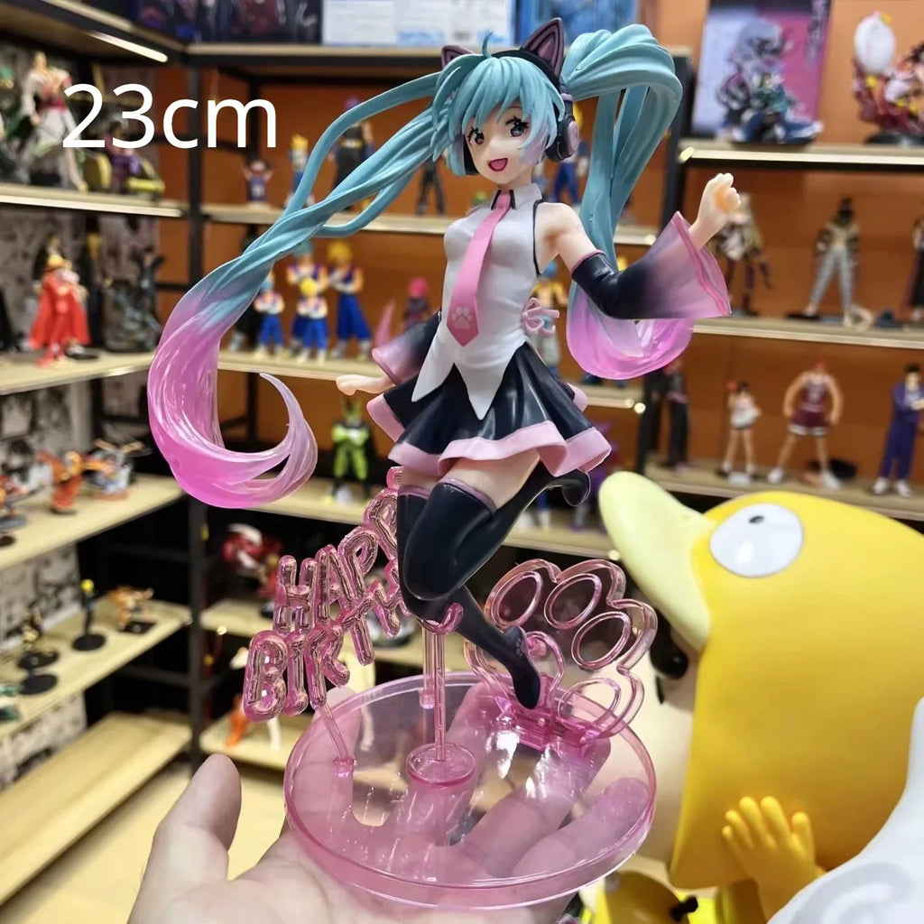 Hatsune and Miku 23cm figurine celebrating a birthday with vibrant colors and playful pose