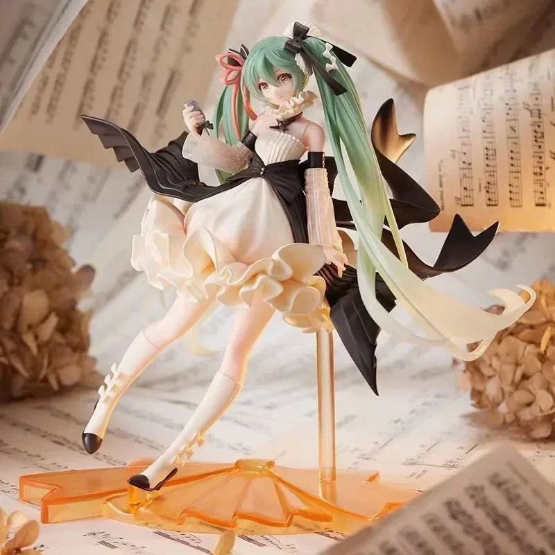 Hatsune and Miku figurine with flowing hair and detailed outfit on a decorative base