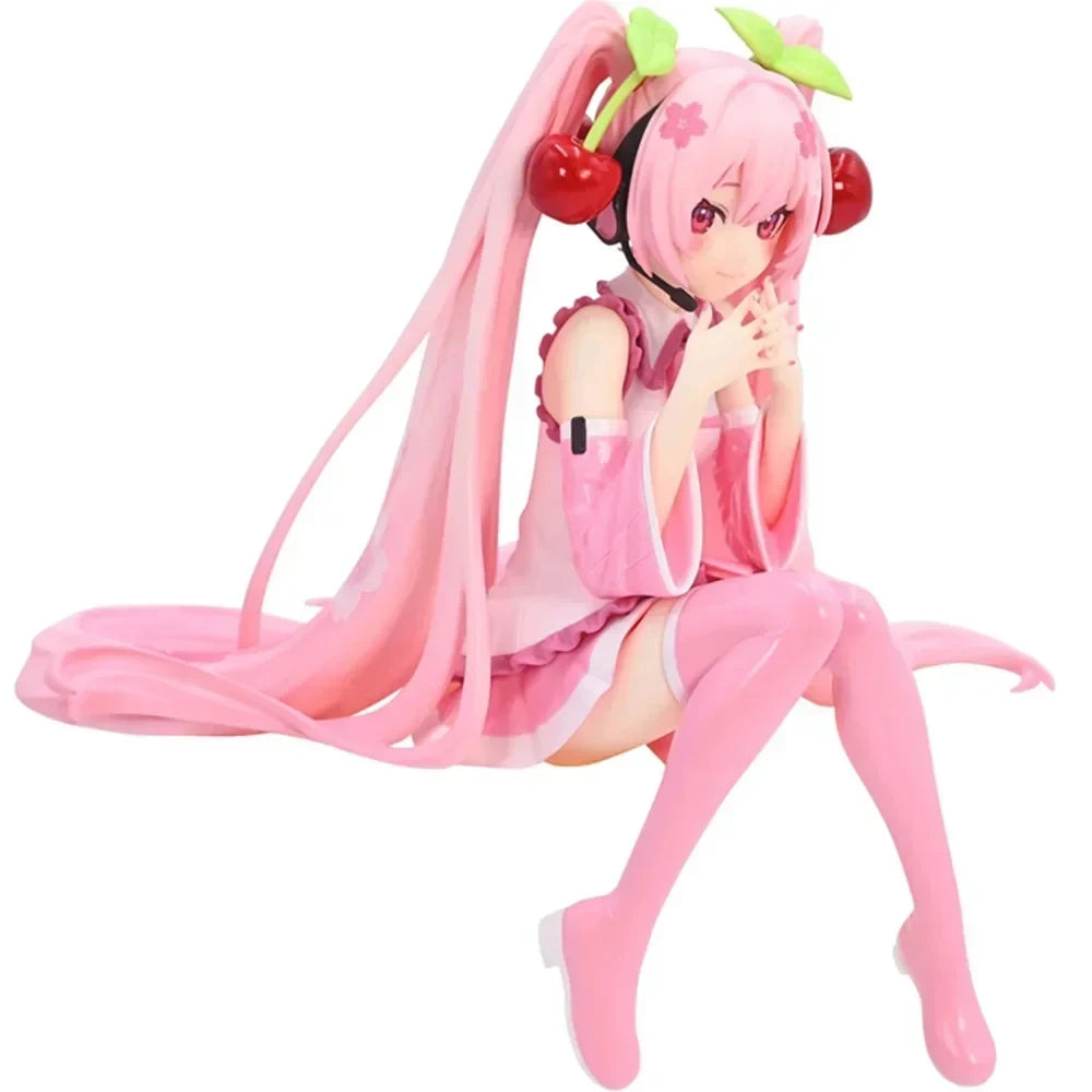 Hatsune and Miku collectible figurine with pink hair and cherry-themed accessories