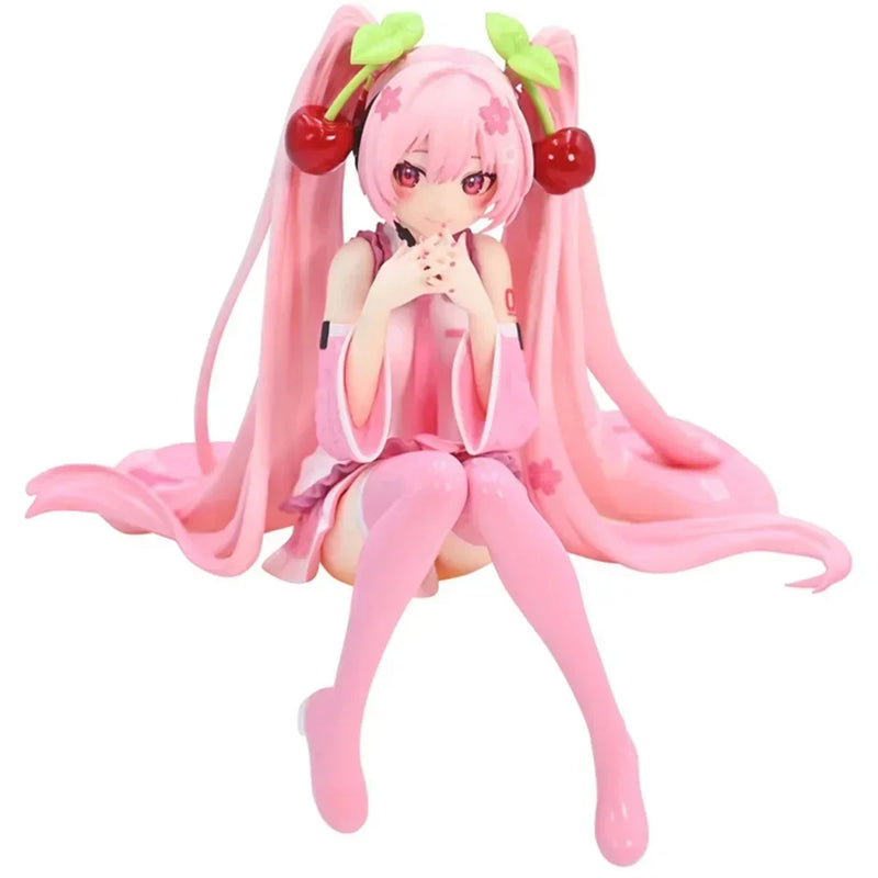 Hatsune and Miku pink figurine with long hair and cherry accessories, perfect for collectors