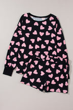 LuckeLadybug LLC Heart to print shorts set with long sleeve top featuring pink hearts on a black background