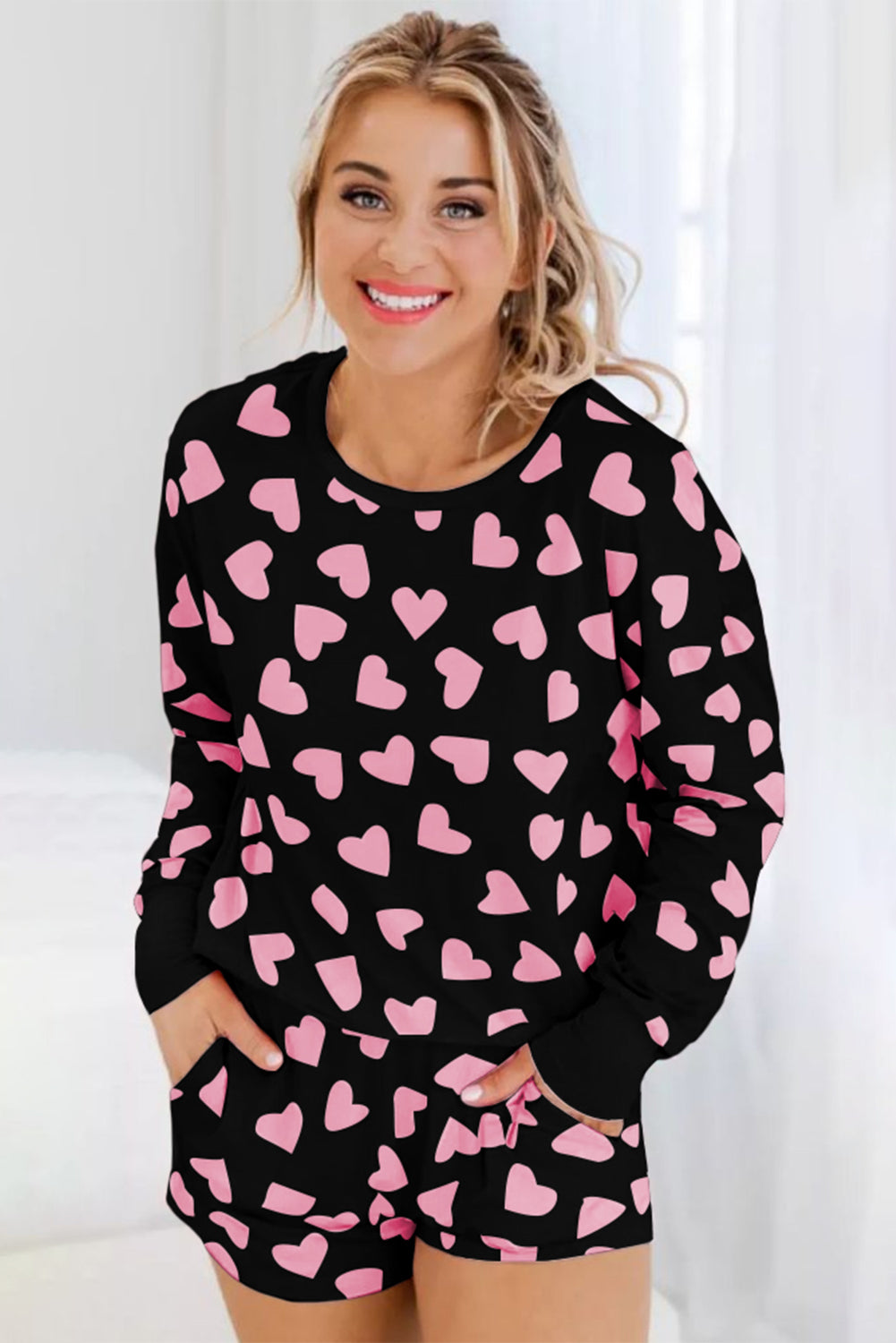 LuckeLadybug Shorts with heart to print in black and pink for a stylish casual look