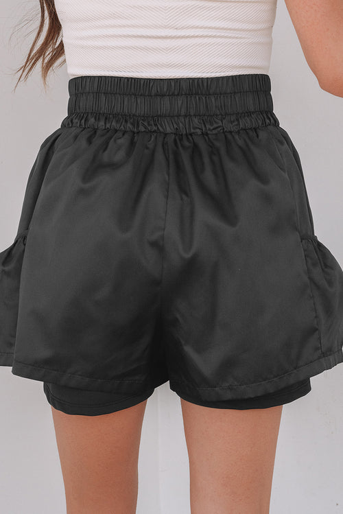 Black high-waist shorts with elastic waistband and side pockets for a comfortable fit