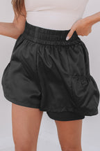 Black high-waist shorts with a comfortable elastic waistband and pockets for casual summer wear