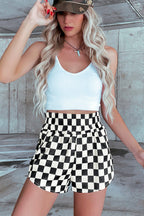 Trendy high-waist shorts in black and white checkered pattern for stylish summer outfits