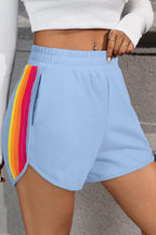 LuckeLAdybug LLC high-waist shorts in blue with colorful side stripes for a trendy look