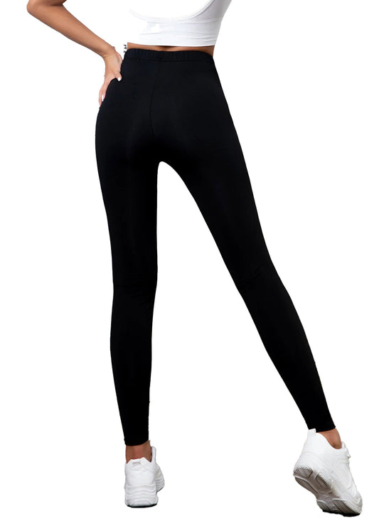 Black high waisted ripped leggings for women by LuckeLadybug LLC, designed for comfort and style