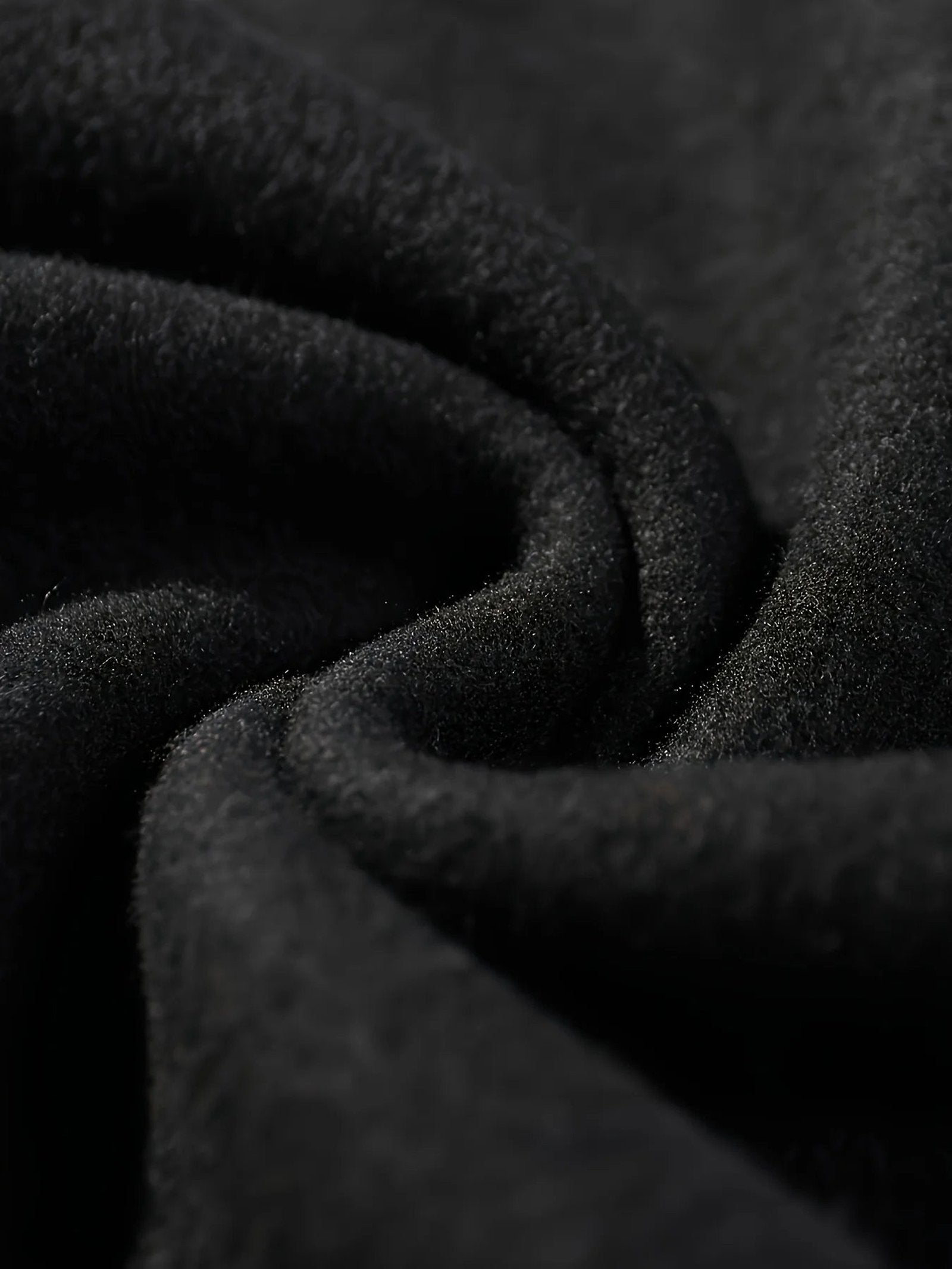 Close-up of soft black fabric showcasing the comfort of a hockey mom hoodie