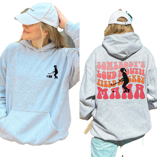 Gray hockey mom hoodie featuring a playful design with a hockey player and bold text for sports fans