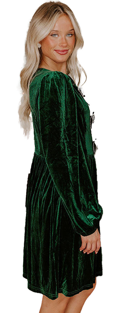 LuckeLadybug model wearing a green velvet mini dress on wooden stairs product keyword fiery red velvet mini dress